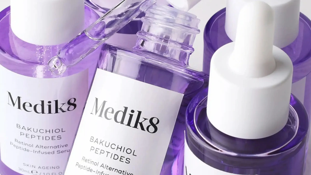 A close up of several bottles of violet coloured Medik8 Bakuchiol Peptides to showcase Fox Collective's beauty PR expertise on their home page.